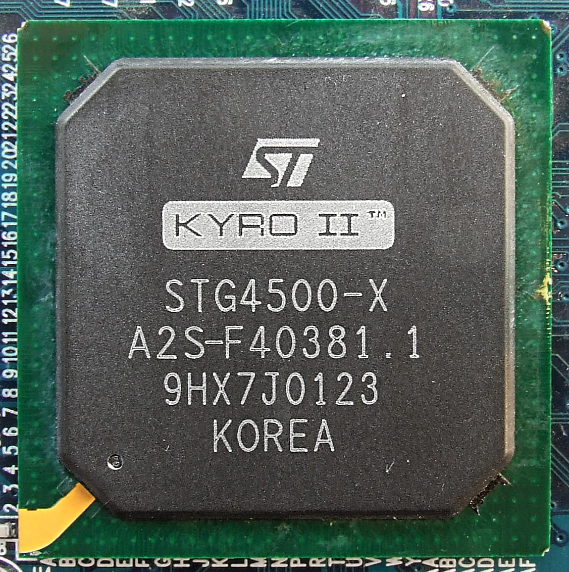 Close-up of an STMicroelectronics STG4500 Kyro II PowerVR graphics processor mounted on a circuit board